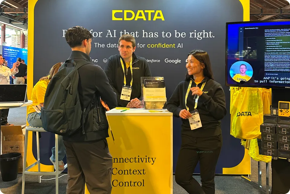 CData team members at expo hall booth
