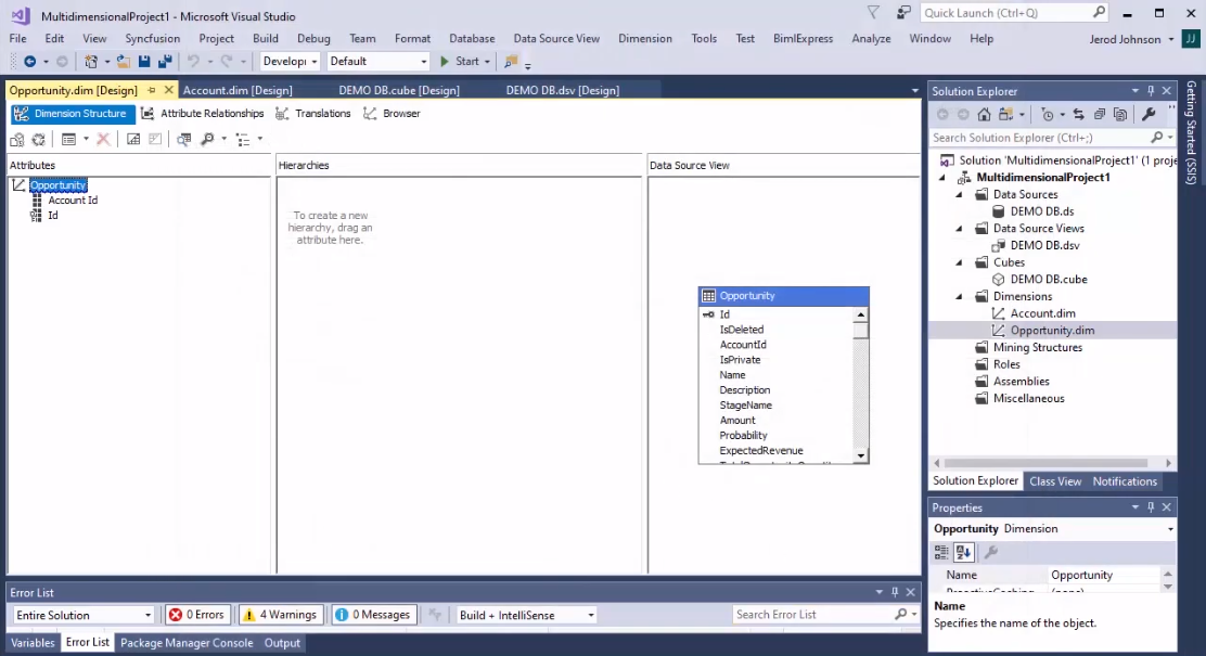 Computer monitor disaplaying analytic data and column charts on a BI tool